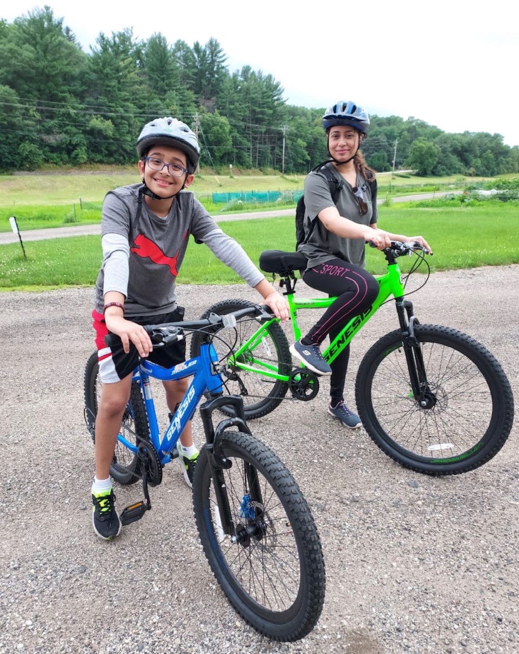 Agashe and son on bicycles