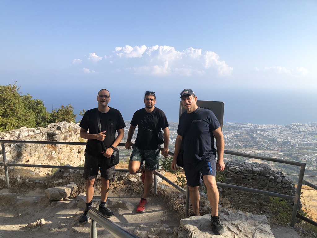 Charalambos (middle) with friends in Cyprus.