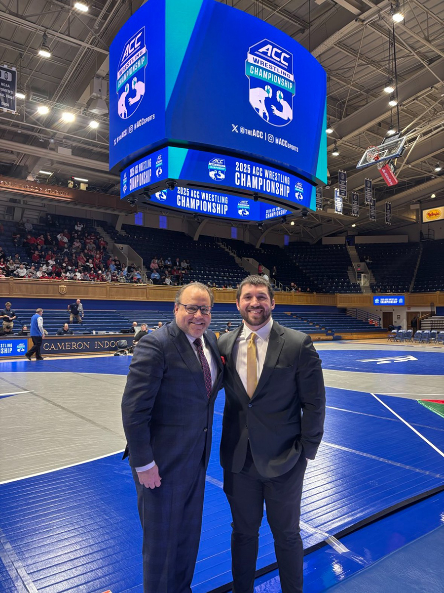 Dean Linke (left) and Dylan Ryan, MD (right) at the ACC Wrestling Championship