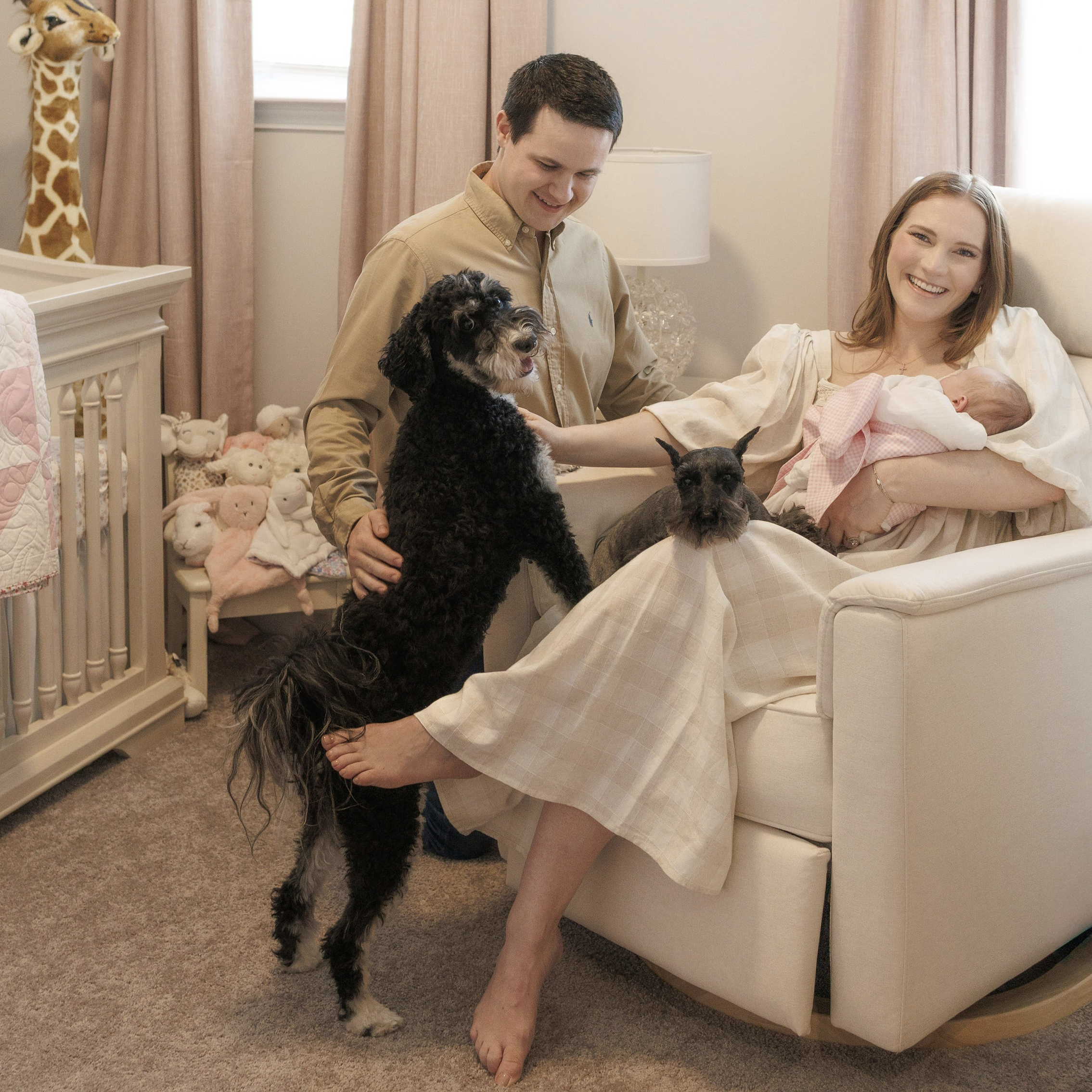 Family photo of Dr. Maher, her husband, daughter and two dogs