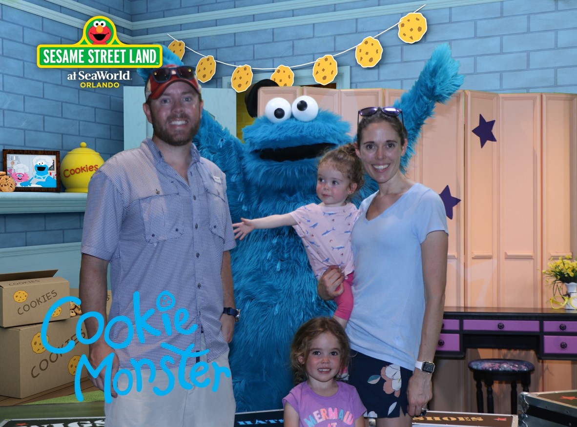 Jacumin enjoys a visit to Orlando's "Sesame Street Land" with her family.