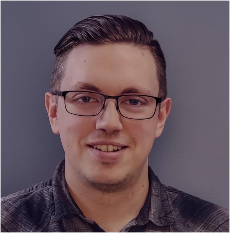 Profile of young man with glasses