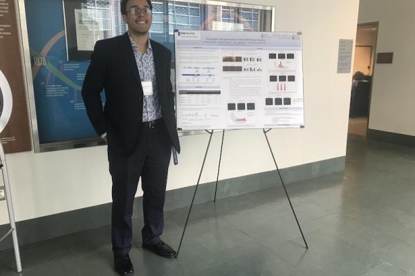 George Crawley presenting poster