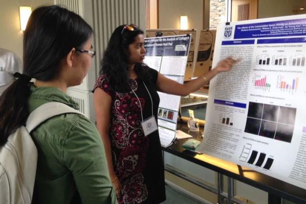 Shobana explains poster presentation