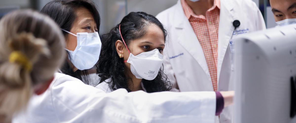 C Chang teaching students in hospital
