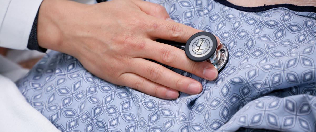 Stethoscope on patient chest