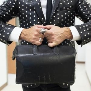 Bedlack with briefcase